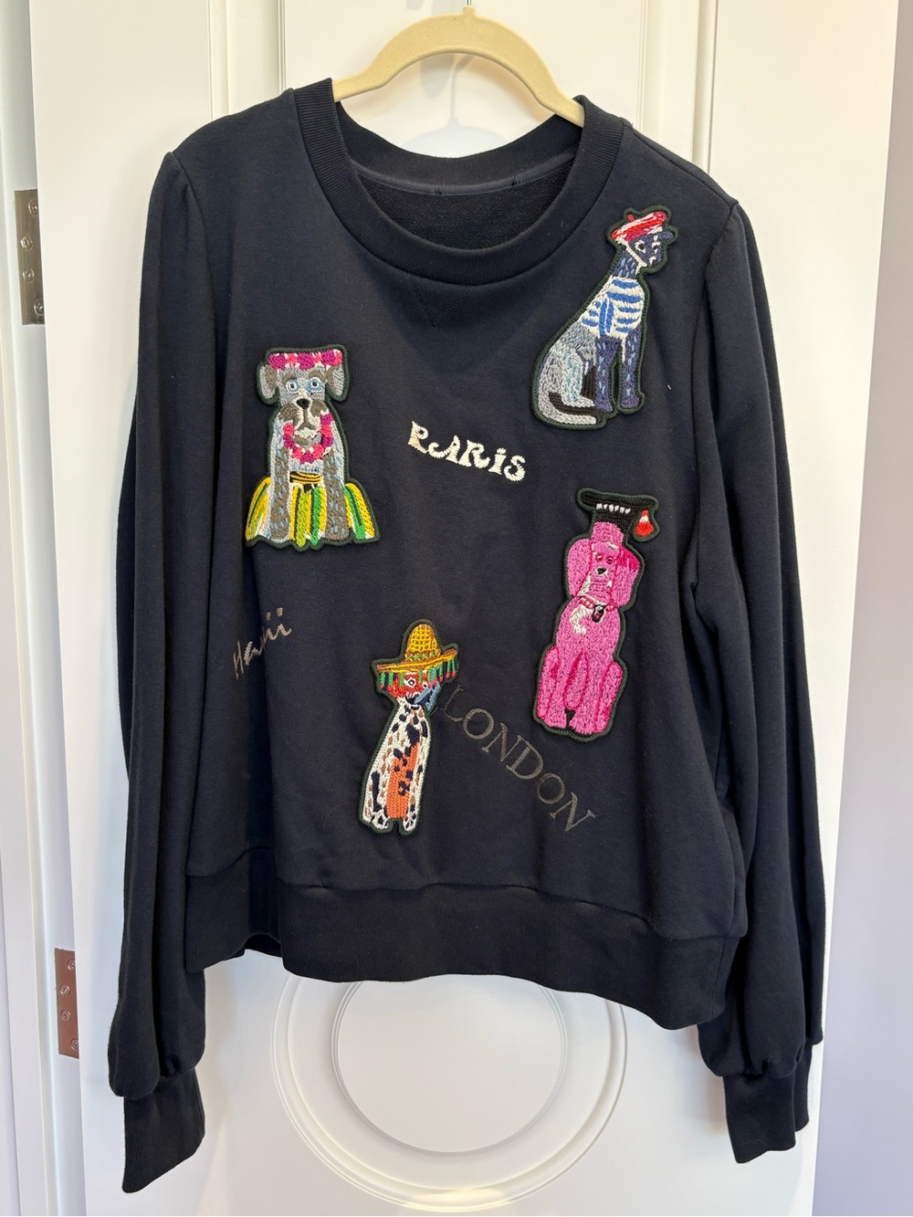 Black Crewneck Sweatshirt with Colorful Dog Patch Appliqués